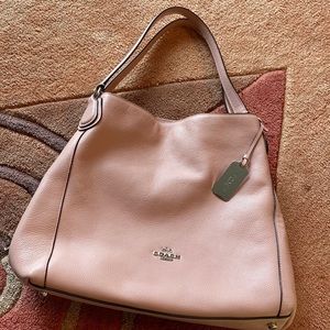Coach, beautiful pink purse, worn only a few times